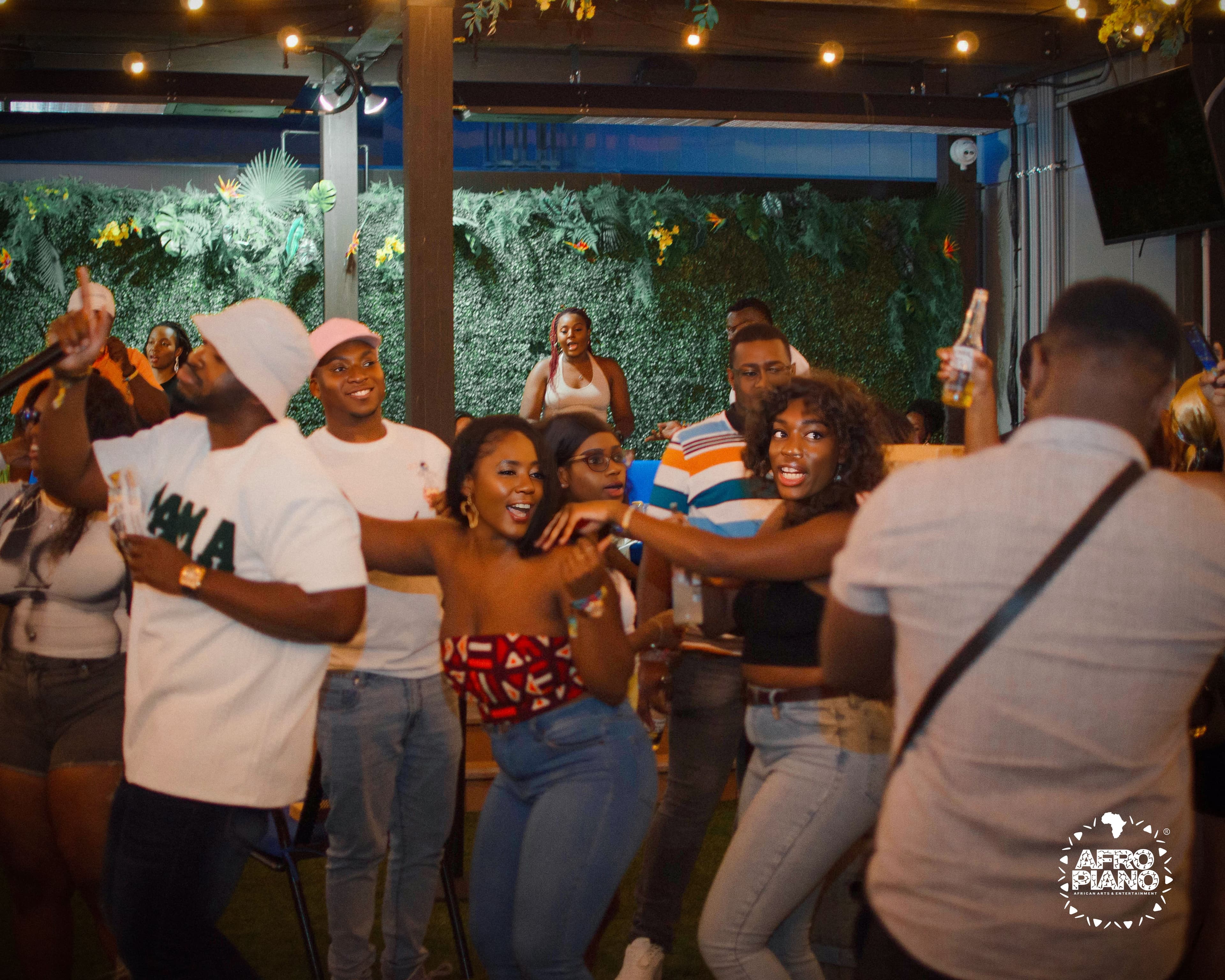 Afropiano event crowd celebrating together